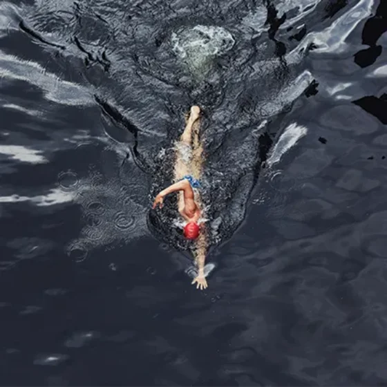 Joe Choong swimming from above