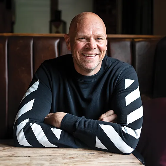 An image of Tom Kerridge seated at a pub table