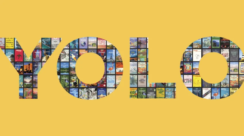 The word YOLO created from a montage of lonely planet book covers