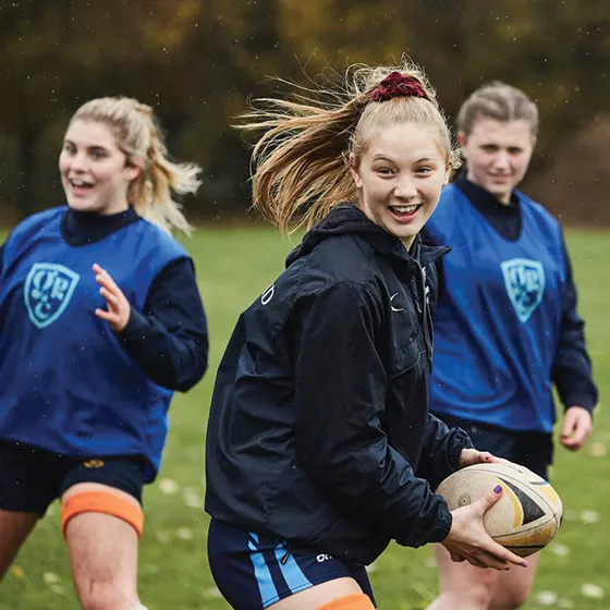 girls-playing-rugby-outdoors