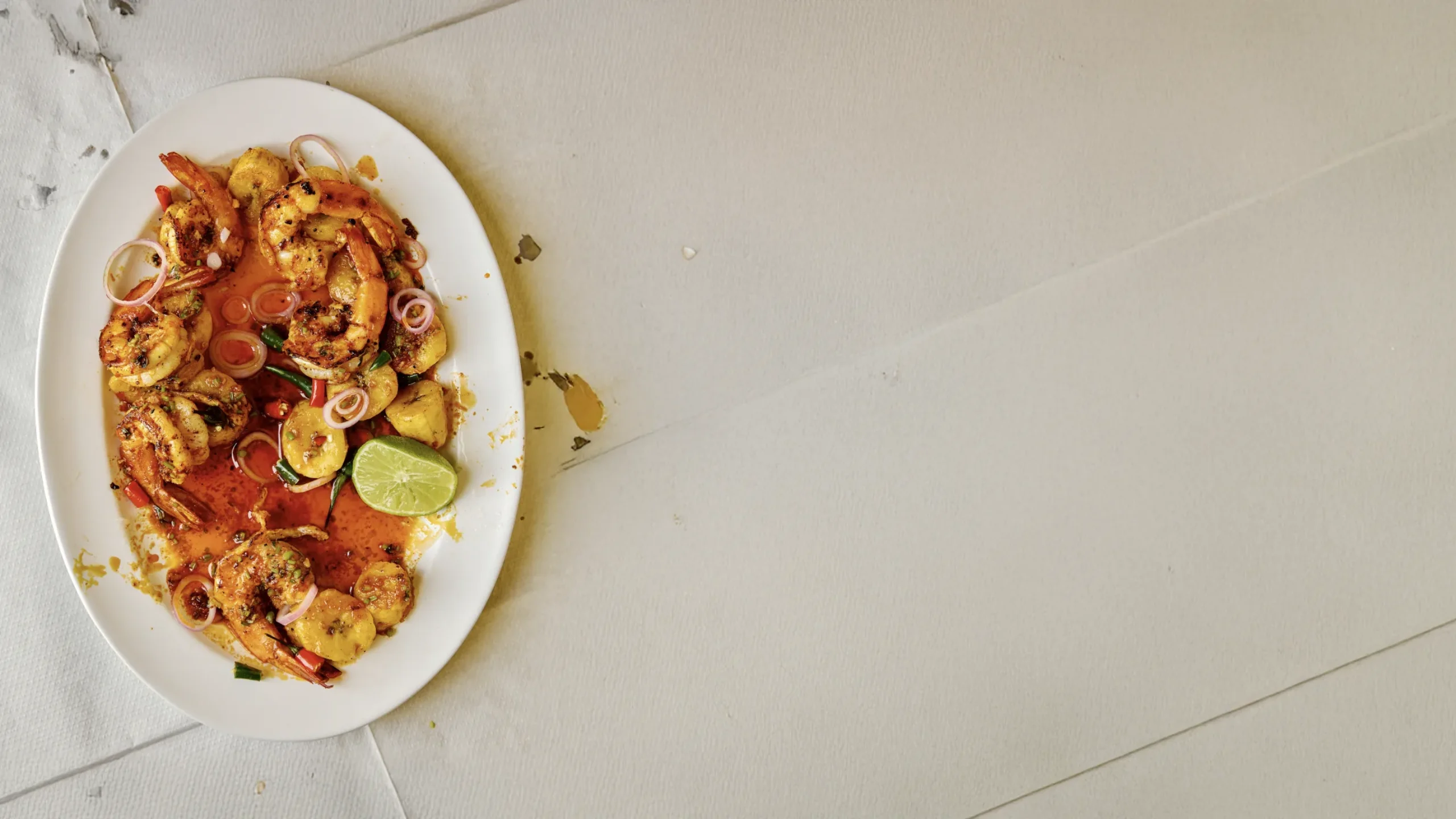 Tropical prawns with plantain and pickled shallots