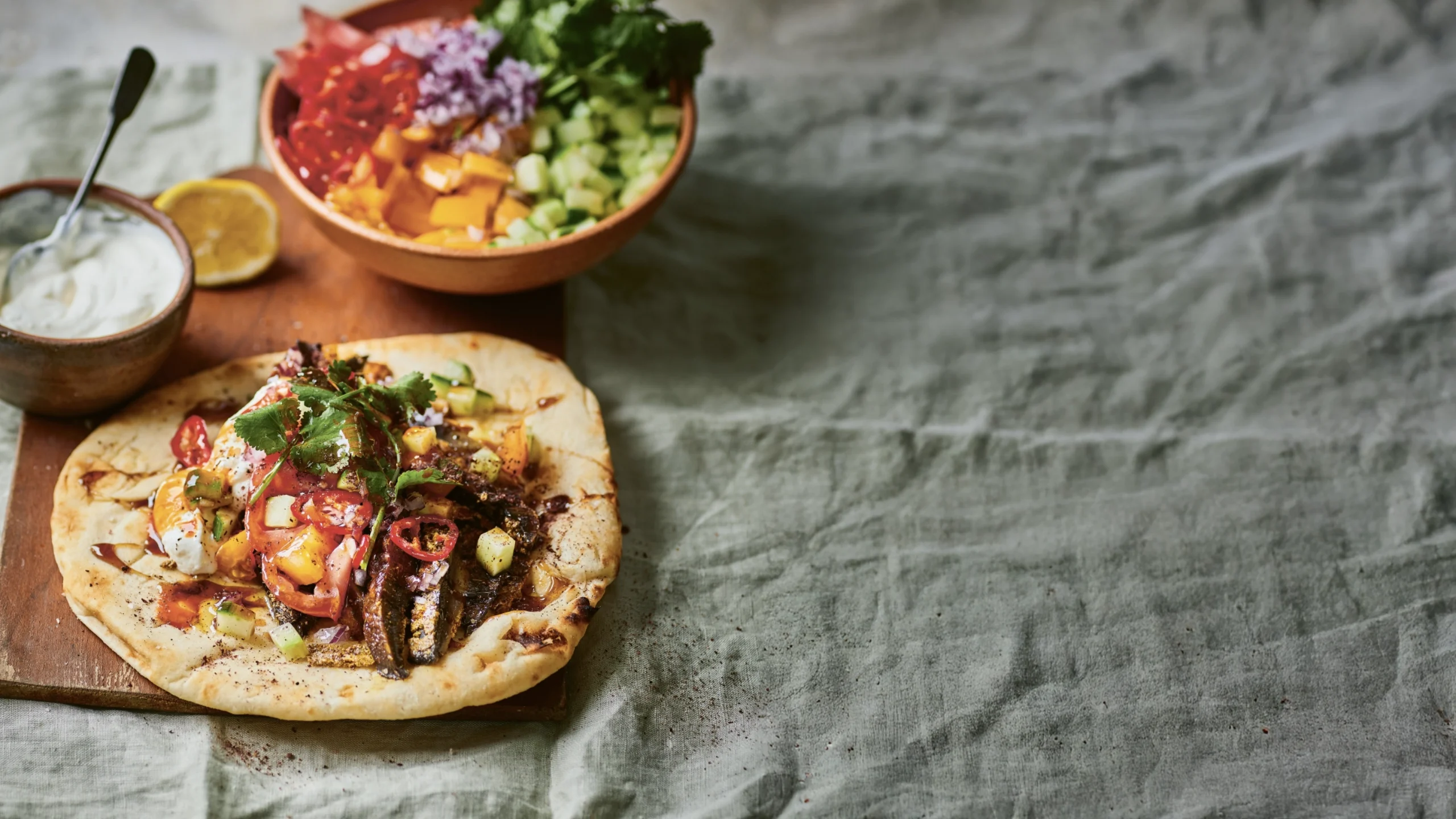 Claire Thompson whips up this juicy spiced mushroom shawarma with chopped salad and pomegranate molasses for a flavour-packed vegetarian feast