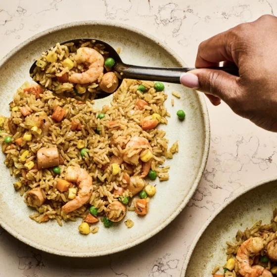 Remi Idowu’s quick West African fried rice, loaded with spices, veggies, prawns and sausage.